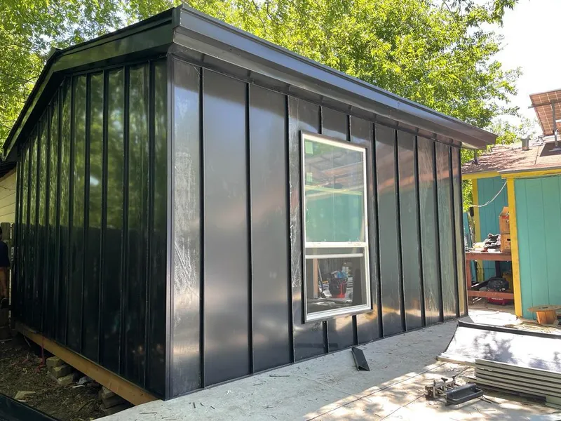 Black standing seam metal wall panels for Metal Roof Installation in Sun Valley