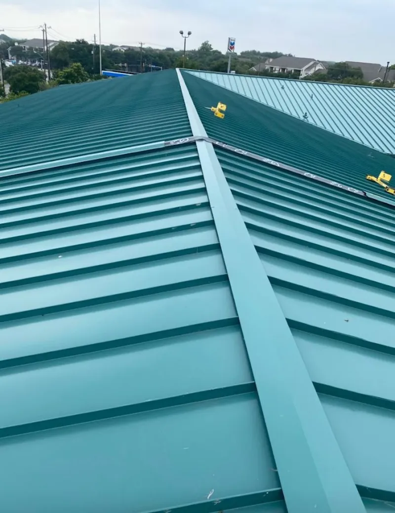 Green commercial metal roof ridge and valley for Metal Roof Repair in Sun Valley